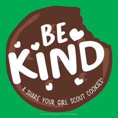 a cookie with the words be kind in white lettering on it, against a green background