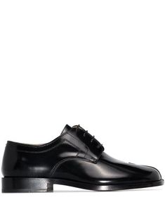 Black leather x Browns 50 Tabi Derby shoes from Maison Margiela featuring Tabi toe, front lace-up fastening and low block heel. Designer Calf Leather Lace-up Derby Shoes, Luxury Lace-up Derby Shoes For Formal Occasions, Luxury Lace-up Derby For Formal Occasions, Luxury Formal Lace-up Derby Shoes, Calf Leather Lace-up Shoes With Pointed Toe For Derby, Pointed Toe Calf Leather Lace-up Shoes For Derby, Pointed Toe Calf Leather Lace-up Shoes, Elegant Calf Leather Derby With Stitched Sole, Designer Lace-up Shoes With Plain Toe For Derby