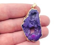 Purple Agate Geode Druzy Slice Pendnat It is also known as a good luck stone. As a stone of harmony, one of the things agate does is balance yin/yang energy. Agate increases energy. ... Emotionally, agate gives courage, emotional strength, self-confidence, and dispels fears. It can also lessen feelings of envy by grounding the emotions. %100 REAL NATURAL STONE GUARANTEED All the stones that we sell are Real Natural Stones. We don`t sell any fake or imitation stones. If you see any of our item th Spiritual Agate Gemstones As Gift, Large Agate Gemstone As A Gift, Large Agate Stone Gemstone For Gift, Healing Agate Pendant Gemstone, Spiritual Agate Gemstone Crystals, Raw Stone Agate Jewelry Gift, Spiritual Agate Crystals For Gifts, Spiritual Agate Crystals As Gift, Large Amethyst Geodes As Gifts