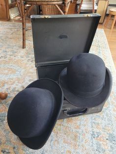 Please read: This is a set of two hats from different manufacturers and a hat box. Hats have lots of worn spots. Great for display or a collection.  They are out of shape because of storage together in the same box. Hat 1: Benson of Philadelphia.  Brim is bend and could be blocked and sewn at the seem where it is loose. Wool felt. Used worn condition.  Hat 2: Princeton Hat co. Brim and top are a little out of shape. Wool felt. Worn, condition.  Box: Made by Luxenberg .Good sturdy hat box with me Box Hat, Bowler Hat, Hat Box, Derby Hats, Hats For Sale, Box Set, Photo Prop, Photo Props, Wool Felt