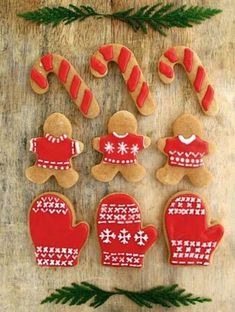 gingerbread cookies decorated with christmas sweaters and candy canes