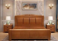 a large bed sitting inside of a bedroom next to two nightstands on either side of the bed