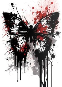 a butterfly with red paint splatters on it