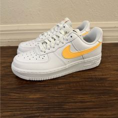 Nike Air Force 1 07 White/Orange Women’s Sneakers Fq2742-100 Orange Low-top Sneakers With Gum Sole, Orange Synthetic Sneakers For Light Sports, Orange Low-top Sneakers For Light Sports, Casual Orange Sneakers With Gum Sole, Orange Custom Sneakers With Gum Sole, Orange Custom Sneakers With Gum Sole For Sports, Custom Orange Sneakers With Gum Sole For Sports, Casual Orange Nike Air Force 1, Nike Air Force 1 Orange For Streetwear