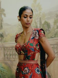 Shine in a red mix print pre-draped sari in dupion silk, elegantly paired with an intricately embroidered blouse. This ensemble offers a seamless blend of vibrant prints and detailed craftsmanship for a striking, sophisticated look. Sophisticated Look, Dupion Silk, Indian Culture, Red Fabric, Mixing Prints, Embroidered Blouse, Vibrant Prints, Edgy Fashion, Every Woman