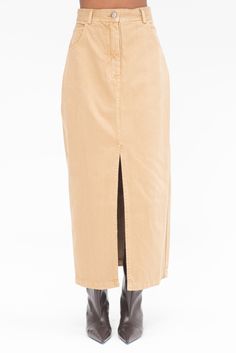 high waisted button-front closure front slit midi length belt loops 100% cotton made in usa model is wearing 2 model is 5’10”, a us 2 and s in tops Polo Pullover, Denim Outerwear, Long Skirts For Women, Kick Pleat, Mid Length Skirts, Dresses Pants, Rachel Comey, Womens Size Chart, Bottom Clothes