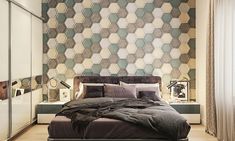 a bedroom with a bed, dressers and wallpaper that has hexagonal tiles on it