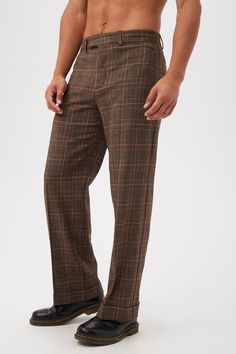 A wide leg and cuffed hem add statement style to these polished plaid trousers, ready for all your fall plans. Pair these wide-leg men's pants with our matching plaid blazer for a complete look. Front tab and zip closure Side slit pockets Wide leg Cuffed hem Full length inseam Made in USA Runs true to size Model is 6'1", wearing size 32See Men's Size Guide FABRIC: Chaka Check Plaid 63% Viscose, 35% Polyester, 1% Elastane Dry clean only Fabric from Portugal Fall Planning, Plaid Trousers, Leg Cuffs, Plaid Blazer, Men's Pants, Mens Bottom, Casual Pants, Mens Pants, Size Guide