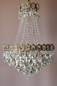 a crystal chandelier hanging from the ceiling