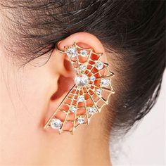 This Blinged Out Ear Cuff Is A Very Cute Addition To Your Style! Just Requires 1 Standard Lobe Piercing; And Cuff Is Secured On Top Of Ear By Bar Behind The Ear. Listing Is For Single Cuff. Cuff Is Available In Gold Color And Silver Color While Supplies Last. Silver Crystal Ear Cuff For Party, Spider Web Earrings, Metal Spider, Spider Web Decoration, Elf Ear Cuff, Mermaid Jewelry, Moon Studs, Heart Drop Earrings, Halloween Spirit