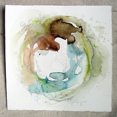 an abstract painting with watercolors and ink on paper in the shape of a circle