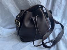 COACH Vintage Lula Brown Leather Drawstring Bucket Bag.  Size: 14"  X 11"  X 5.5" W Strap drop full: 24".  You can see the amazing quality of the leather of this bag. In great condition, See pictures as any problems will be shown in the pictures. ITEM IN PICTURE IS WHAT YOU WILL RECEIVE Shipping: I provide free shipping insured by USPS. I am not responsible for any item after it is with USPS. Returns: I accept returns, but the buyer must pay for return shipping regardless of the reason for return. Items must be returned within 14 days of receipt. Combined shipping: I am happy to combine shipping for multiple purchases for free. Luxury Vintage Bucket Bag With Leather Handles, Drawstring Bucket Bag, Dec 8, Vintage Coach, Backpack Purse, The Amazing, Bucket Bag, Labour Day, Brown Leather