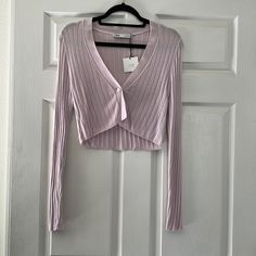 Nwt Never Worn! Beautiful Light Purple/Pink Color And Super Soft. Great Staple To Add To Your Closet. Chic Purple Cardigan For Spring, Lavender V-neck Cardigan For Fall, Chic Purple Long Sleeve Cardigan, Fitted Long Sleeve Lavender Sweater, Fitted Lavender Long Sleeve Sweater, Trendy Lavender Long Sleeve Cardigan, Trendy Long Sleeve Lavender Cardigan, Lavender Fitted Cardigan For Fall, Mauve Long Sleeve Tops For Winter