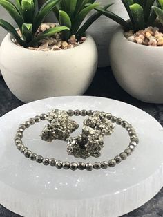 You will Absolutely LOVE❤️  this Dainty PYRITE Gemstone Bracelet ! Wearing PYRITE every day can protect you and your loved ones from evil spirits and provide health and fortune to you and your family. Get some pyrite as quickly as you can if it speaks to you. This Unique High Quality Pyrite (Faceted Bead)  4mm Crystal Bracelet makes a gift they will ABSOLUTELY LOVE !  You can Also add some Small Raw Pyrite Crystals to your Bracelet Order. Includes Powerful Pyrite Daily Affirmations ❤️There is a Money Bracelet, Pyrite Bracelet, Flower Girl Bracelets, Beaded Leather Wraps, Aromatherapy Bracelet, Aromatherapy Jewelry, Sterling Silver Bead Bracelet, Pyrite Crystal, Silver Bead Bracelet