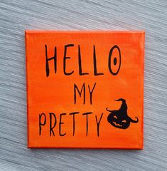 an orange patch with the words hello my prettyy written in black ink on it