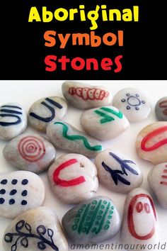 rocks with different symbols painted on them and the words, aborninal symbol stones