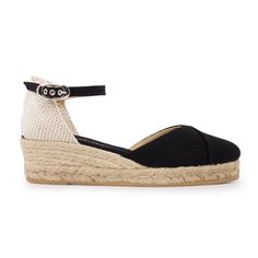 "100% Vegan, Organic and Sustainable. Authentic Espadrilles, Handcrafted by Artisans. Designed in Barcelona, Made in Spain These organic cotton canvas espadrilles with a 2\" inch low wedge heel are inspired by the Mediterranean and designed for breathability, comfort, and style. Made in Spain, these are an authentic pair of exquisite, espadrilles - made by artisans who preserve centuries-old traditions of shoemaking. * Lightweight Summer Espadrilles * Authentic. Made by artisans in Spain * Desig Summer Espadrilles, Spanish Espadrilles, Spain Design, Vegan Sandals, Low Heel Wedges, Low Wedges, Black Wedges, The Mediterranean, Sierra Leone