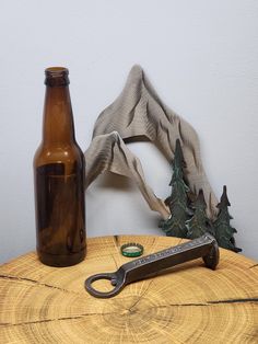 Hand forged from a simple railroad spike, this beer bottle opener is a fun gift for men! Groomsmen's gifts they will love and use, not throw in a drawer and forget it. Perfect for a 6th anniversary traditional gift of iron or an 11th anniversary traditional steel gift. Made from steel containing a high iron content, it works well as either traditional anniversary gift. Boyfriend having a birthday? Best friend getting married? This is a great gift for any occasion. Perfect for train and railroad enthusiasts as well. 6.5" in length. STAMPING LOCATION OPTIONS: 1. No Stamping 2. Top Stamping (20 character limit) 3. Side Stamping (40 Character limit, 20 per side) 4. Combination (Tell us what combination you want. BE SPECIFIC.) SHIPPING: Shipping is calculated buy zone and weight. Northern Cresc Western Groomsman Gifts, Best Friend Getting Married, Whiskey Groomsmen Gift, Railroad Spike Bottle Opener, Horseshoe Bottle Opener, Rustic Bottle Opener, Unique Bottle Openers, Birthday Best Friend, Traditional Anniversary Gifts