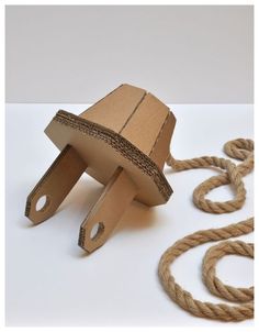 an object made out of cardboard and rope