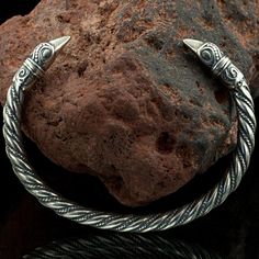 Viking Raven Arm Ring - Sterling Silver | Huginn Muninn Torc Bracelet Material: Solid 925 Sterling Silver. About 31 grams (depending on size) Wrist Circumference Sizes: 13cm (5.1") through 25cm (9.8"), all are slightly adjustable. Worldwide shipping available!Custom order. Please allow an additional week or two for delivery times. Arm Rings, Viking Arm Rings, Viking Aesthetic, Art Viking, Arm Ring, Viking Raven, Norse Jewelry, Animal Bracelet, Bracelet Viking