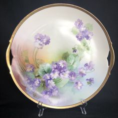 Antique KPM Germany Hand Painted Floral Violets Plate Gold Signed 1900-1927  Signed Osborne The initials KPM stand for the Königliche Porzellan Manufaktur (Royal Porcelain Factory) in Berlin. Each piece is a unique product signed by the artist. The factory is more than 250 years old factory and continues to produce the finest porcelain articles almost exclusively by hand. Old Factory, Gold Sign, Painted Porcelain, Hand Painted Porcelain, Fine Porcelain, Floral Painting, Berlin, Initials