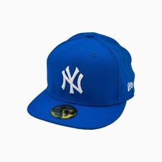 Stay true to your team with the New York Yankees MLB 59FIFTY Fitted Hat from New Era. Show off your support while enjoying the comfort and style this hat provides. Made with high-quality materials, this fitted hat is the perfect accessory for any Yankees fan. Color: Blue / White Style: NENYY-BLUWHTE Yankees Fan, Blue And White Style, Blue Hat, Stay True, Hats For Sale, Fitted Hat, New York Yankees, White Style, Fitted Hats