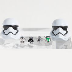 Embrace the dark side of the Force in the Star Wars™ The Empire Stud Set. This set includes the Darth Vader™, Stormtrooper, Boba Fett™, and Death Star™ inspired studs. The bold colors in this set evoke immense power and remind us that without darkness, there can be no light. 18k gold, 18k rose gold, or rhodium plated over brass with a protective coating Sterling silver posts and plated butterfly backings Cubic zirconia stones Approx. 7mm wide Includes 4 mismatched studs Shop our entire Star Wars Dark Side Of The Force, Star Wars Jewelry, No Light, Necklace Chain Lengths, Stud Set, The Dark Side, The Force, Wrap Rings, Brass Pendant