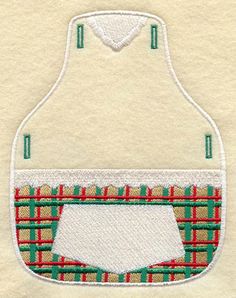 a white apron with green and red plaid pocket on it's side, embroidered onto the front