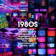 the inside of a store with neon lights and televisions on it's walls