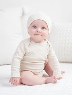 Buttery soft and versatile, our organic long sleeve bodysuit is an essential piece for any growing baby. Made of 100% organic cotton fabric Nickel-free snaps Water-based dyes ensuring long-lasting color vibrancy and durability Sustainably sourced and ethically produced Naturally hypoallergenic Solid Cotton Long Sleeve Bodysuit, Long Sleeve Solid Cotton Bodysuit, Solid Long Sleeve Cotton Bodysuit, White Cotton Long Sleeve Bodysuit, Fitted Organic Cotton Long Sleeve Onesie, Fitted Long Sleeve Organic Cotton Onesie, Cream Long Sleeve Cotton Onesie, Unisex Long Sleeve Cotton Onesie, Cotton Long Sleeve Onesie