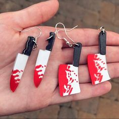 These edgy bloody knife earrings, available in two different styles, are made using nickel free and hypoallergenic earring hooks! Clay Knife Earrings, Crazy Earrings Clay, Alt Earrings Diy, Funky Earrings Aesthetic, Weirdcore Earrings, Fun Clay Earrings, Funky Earrings Diy, Aesthetic Clay Earrings, Funky Clay Earrings