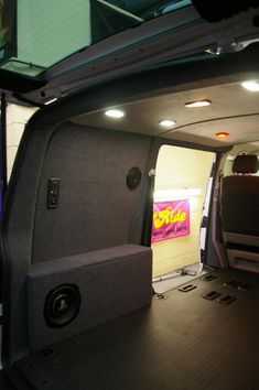 the inside of a van with its door open