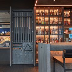 the inside of a restaurant with wooden tables and chairs