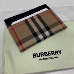 Brand New, Never Used Burberry Card Holder Black And Classic Checker Design Center Slot Compartment Approx Size 3 X4.1 X 4.1inches Open To Offers Checker Design, Burberry Black, Burberry London, Design Center, Burberry Bag, Black Tan, Black And Tan, Wallets, Burberry