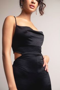 "Got You Covered With The Juliette Satin Cowl Neck Cut Out Jumpsuit. This Black Satin Jumpsuit Features A Cowl Neckline, Cutout Details, And A Stretchy Elastic Waistband. Bonus: The Soft Satin Material Makes This Jumpsuit An Elegant Outfit To Wear For Formal Occasions Or Parties." Solid Satin Jumpsuits And Rompers For Night Out, Black Satin Evening Jumpsuit/romper, Black Satin Evening Jumpsuit Or Romper, Black Satin Party Jumpsuits And Rompers, Black Satin Evening Jumpsuit, Black Satin Jumpsuits And Rompers For Evening, Black Satin Jumpsuit For Evening, Black Satin Jumpsuits And Rompers For Party, Elegant Cutout Bodysuit For Party