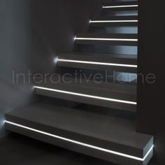 the stairs are lit up with white lights