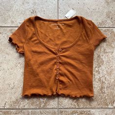 Aeropostale Crop Top Never Worn, A Rustic Orangish Brown Color / Caramel. Size Small. Aeropostale Crop Tops, Light Pink Crop Top, Cropped Long Sleeve Top, Wrap Crop Tops, Crop Top Tees, Blue Crop Tops, Crop Top Shirts, Tokio Hotel, Print Crop Tops