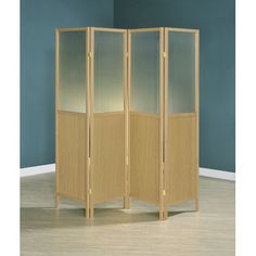 the room divider is made out of wood and has glass doors on each side