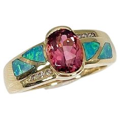 14k yellow gold fashion ring with a pink tourmaline center stone along with opal and diamond accents. The measurement of the center stone is 8.8 x 5.6 mm, and the ring has a total weight of 4.41 grams. Gold Rings Fashion, I Love Jewelry, Fashion Ring, Opal Ring, Gold Fashion, Opal Rings, Pink Tourmaline, Monster High, Fashion Rings