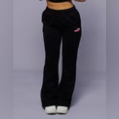 Brand New Sweatpants. Never Worn. Size Small Black Mid-rise Pants For Loungewear, Black Fitted Mid-rise Sweatpants, Black Mid-rise Athleisure Pants, Black Sports Pants Mid-rise, Black Mid-rise Sports Pants, Trendy Fitted Black Sweatpants, Sporty Mid-rise Black Pants, Sporty Black Mid-rise Pants, Flare Sweatpants