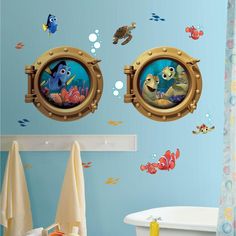 the little mermaid wall decals are in an ocean themed bathroom with fish and bubbles