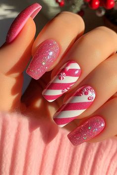 I’m obsessed with how pink nails are trending this Christmas! They’re festive and oh-so-chic. What’s your take on this idea? I’d love to hear your opinions—please comment below about this lovely pink Christmas nail design! Christmas Nail Ideas Acrylic, Pink Christmas Nail, Pink Christmas Nails, Christmas Nail Design, Festive Nail Art, Plaid Nails, Christmas Nails Easy, Christmas Gel Nails, Christmas Nail Art Designs