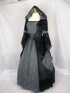 This is for a custom made dress,it will be made to the measurements you send me. Please send me your bust,waist and hip measurement,and please measure from the top of your shoulder to the floor with shoes on. It will be made with beautiful black crushed velvet and stunning grey and black jacquard  .It will have a corset style front and back with black lacing so you can adjust the dress to fit your body shape. Combined shipping on multiple items. If you purchase express shipping by courier please send me your phone number thank you. Customizable Length Ball Gown With Fitted Bodice, Black Fitted Gown With Boned Bodice, Fitted Black Gown With Boned Bodice, Fitted Gothic Ball Gown, Gothic Ball Gown With Fitted Bodice, Gothic Ball Gown For Wedding, Fitted A-line Corset Dress For Costume Party, Gothic Fitted Gown For Costume, Fitted Gothic Gown For Costume