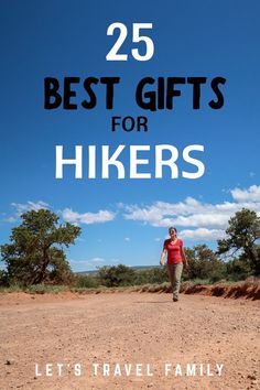 a woman walking across a dirt field with the words 25 best gifts for hikers