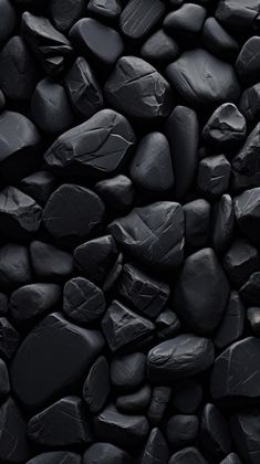 black rocks textured together in the shape of a wallpaper or background for your project