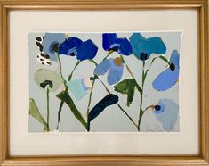 a painting of blue flowers in a gold frame