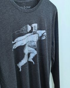 a t - shirt with an image of a monkey on it