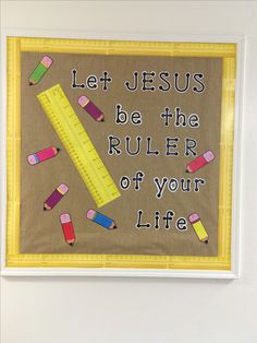 a bulletin board with a ruler and pencils on it that says let jesus be the ruler of your life