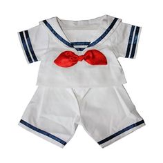 a white shirt and shorts with a red bow on it