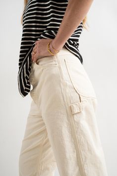 A steadfast remake of a classic workwear garment utilising vintage construction and quality materials. Cut from a lightweight textured cotton twill, the pants feature a button fly, top snap button, coin pocket, triple needle construction and bartack reinforcements, and tool pocket on the right leg and a hammer loop on the left. Cut with a high rise and straight leg fit for comfort and mobility. 100% Cotton Made in Japan Vintage Construction, Classic Workwear, Painters Pants, Garden Clogs, Studio Nicholson, Knit Outerwear, Black Crane, Rachel Comey, Women Accessories Jewelry